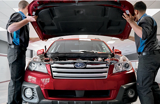 Steve Moyer Collision Center technicians working on a vehicle